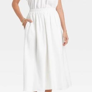 Smocked waist mid rise skirt white by a new day.